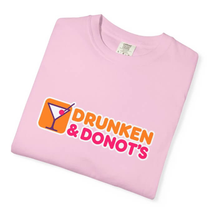 Pink t-shirt with 'Drunken & Donot's' logo on a white background