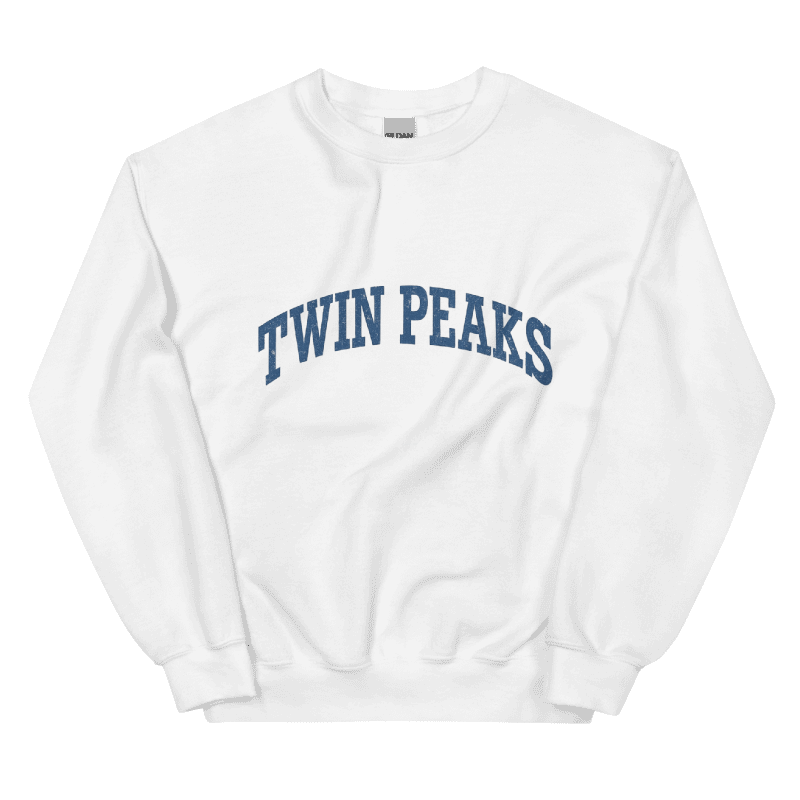 White sweatshirt with 'TWIN PEAKS' text in blue on a black background